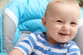 Baby boy sitting in highchair Royalty Free Stock Photo