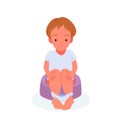 Baby boy sitting on potty, child training, adorable small kid learning to use toilet