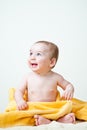 Baby Boy Sitting Wrapped in Yellow Towel Royalty Free Stock Photo