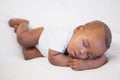 Baby boy sleeping peacefully on couch Royalty Free Stock Photo