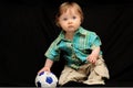 Baby boy with soccer ball Royalty Free Stock Photo