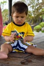 Baby boy at Tanha Lot, Bali Indonesia, Little Beautiful baby at Tanha lot beach view in the evening at Bali