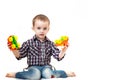 Baby boy toddler playing with toy car isolated Royalty Free Stock Photo