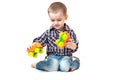 Baby boy toddler playing with toy car isolated Royalty Free Stock Photo