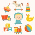 Baby boy with toys : ball, blocks, rubber duck, rocking horse, toy train, pyramid, spinning top, toy truck. Royalty Free Stock Photo