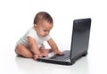 Baby Boy Typing on a Laptop Computer Royalty Free Stock Photo