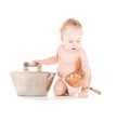 Baby boy with wash-tub and scoop Royalty Free Stock Photo
