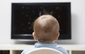 Baby boy watching cartoons on TV Royalty Free Stock Photo