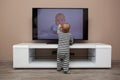 Baby boy watching television Royalty Free Stock Photo