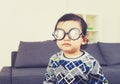 Baby boy wear thick glasses Royalty Free Stock Photo