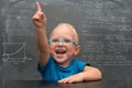 Baby boy wearing glasses with a clever look. Royalty Free Stock Photo