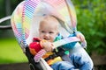 Baby boy in white stroller Royalty Free Stock Photo