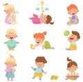 Baby Boys and Girls Sitting on the Floor and Playing with Their Toys Vector Set Royalty Free Stock Photo