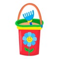 Baby bucket with sand rake isolated on white background. Beach toys for children. Red kids bucket with pattern of flower Royalty Free Stock Photo