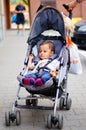 Baby in buggy Royalty Free Stock Photo