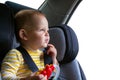 Baby in car seat. Isolated on white. Royalty Free Stock Photo