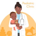 Pediatric Checkup. The Doctor holds the Baby in his arms.