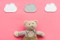 Baby care. Newborn baby concept. Baby sleep concept. Teddy bear toy near clouds on pink background top view space for