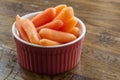 Baby Carrots in a Red and White Bowl Royalty Free Stock Photo