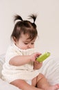 Baby with cell phone in hand Royalty Free Stock Photo