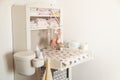 Baby changing table in light bedroom