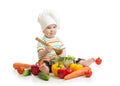 Baby chef with healthy food vegetables and pan