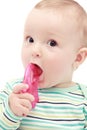 Baby with chew toy Royalty Free Stock Photo