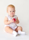 Baby chewing an apple