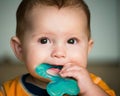 Baby chewing on teething ring Royalty Free Stock Photo