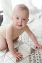 Baby with chickenpox on floor Royalty Free Stock Photo