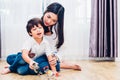 Baby child boy kindergarten playing toy with beautiful mother Royalty Free Stock Photo