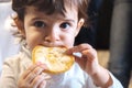 Baby child eat carbohydrates newborn eating face closeup portrait unhealthy diet for kids