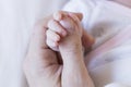 Baby Child holding father`s hand, close up view. love and family concept Royalty Free Stock Photo