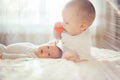 baby child lying on belly weared diaper with teether Royalty Free Stock Photo