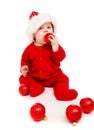 Baby with Christmas balls Royalty Free Stock Photo