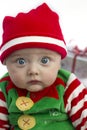 Baby at christmas with present Royalty Free Stock Photo