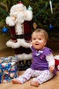 Baby with Christmas present Royalty Free Stock Photo