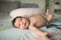 Baby close up. lying on the couch in the parent room. picture of a newborn baby curled up sleeping on a blanket