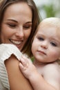 Baby, closeup and mom outdoor with love for boy in garden or backyard. Infant, kid and mother bonding together in hug Royalty Free Stock Photo