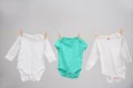 Baby clothes hanging on washing line Royalty Free Stock Photo