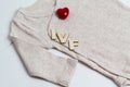 Baby clothes with wooden text IVF and heart. Concept - IVF, in vitro fertilization. Waiting for baby, pregnant Royalty Free Stock Photo