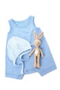 Baby clothes and toy rabbit isolated on white background Royalty Free Stock Photo