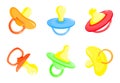 Baby colourful pacifiers set of vector illustrations. Dummy, soother, teether, binky, baby comforter Royalty Free Stock Photo