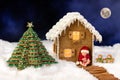 Baby composite with christmas candy house Royalty Free Stock Photo