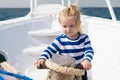 Baby concept. Cute baby sailor. Little baby travel on ship in sea. Baby on summer vacation