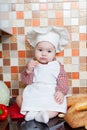 Baby cook with bread