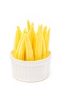 Baby corn in a cup isolated on white background Royalty Free Stock Photo