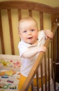 Baby in cot Royalty Free Stock Photo
