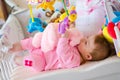 Baby in a cot Royalty Free Stock Photo