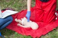 Baby CPR dummy first aid training Royalty Free Stock Photo